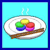 A white plate with a pile of coins in five colours